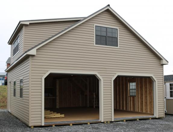 Pine Creek 24x28 Two Story Cape Cod Garage with Artisan Clay walls, Warm Sandalwood trim and Bronze shutters, and Burnish Slate metal roof