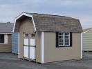 10x12 Dutch shed with clay siding and natural timber shingles