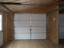 24' x 32' two-car modular garage with vinyl siding and upgraded flooring